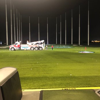 Topgolf - View from bay 112 of tow truck on the course! - Golf Near Me - San Jose, California Topgolf - View from bay 112 of tow truck on the course! - Golf Near Me - San Jose, California