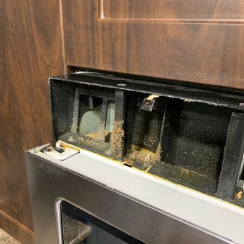 Village Oaks - Grease build up in microwave hood - Apartments Near Me - Chino Hills, California