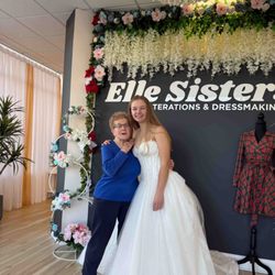 Elle Sisters - Sleeveless white ball gown.