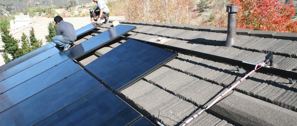 Slide of Tip Top Roofing