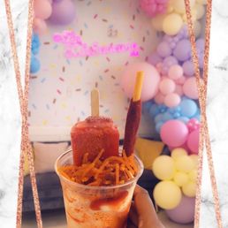 Pineapple mangonada with strawberry popsicle. Pineapple mangonada with strawberry popsicle.