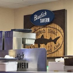 Bluetick Tavern - Sign on wall