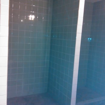 Cerda Construction - a bathroom with a glass shower stall - General Contractors Near Me Cerda Construction - a bathroom with a glass shower stall - General Contractors Near Me