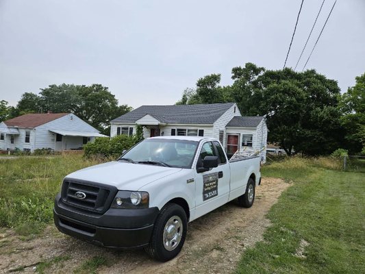 Weatherproof Roofing Logo
