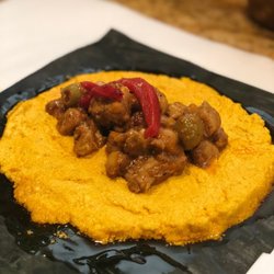 Mama Roc's Puerto Rican & Caribbean Cuisine - The delicious and savory filling inside a Puerto Rican Pasteles made by Mama Roc!