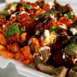 Shah's Halal Cart - Mix Platter White Sauce, Green Sauce, BBQ Sauce & Hot Sauce! $5.99 w/ Free Soda... Portions are big Food is *Just Ok* Nothing special