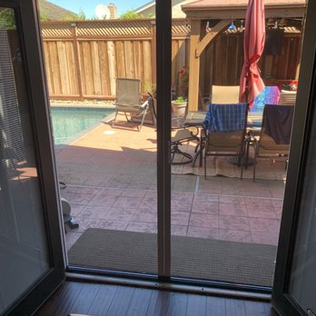 ClearView Retractable Screens - View from inside the house looking out. - Shades & Blinds Near Me - Gilroy, California