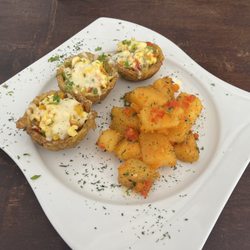 Orgánico Bistro - Papas salteada con revoltillo y plátano