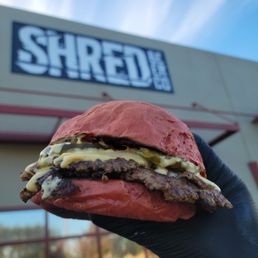 Exterior outside entrance of Stoner Burger - Double cheeseburger Exterior outside entrance of Stoner Burger - Double cheeseburger