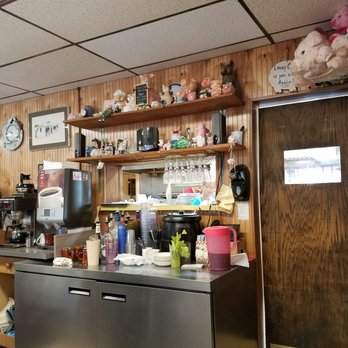 The Stuffed Pig - View from the table. Full of pig trinkets - Breakfast & Brunch Near Me - Marathon, Florida The Stuffed Pig - View from the table. Full of pig trinkets - Breakfast & Brunch Near Me - Marathon, Florida