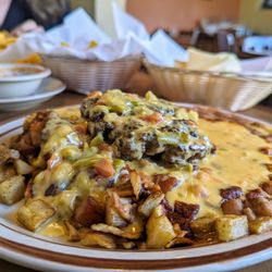 Sadie's Of New Mexico - Roberto's Special, Christmas (again). Half-pound char-grilled beef patty, chile con queso, chiles, papas y beans