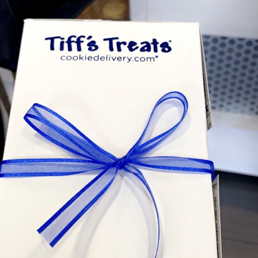 Tiff's Treats - a person holding a box of treats - Desserts Near Me - Addison, Texas Tiff's Treats - a person holding a box of treats - Desserts Near Me - Addison, Texas