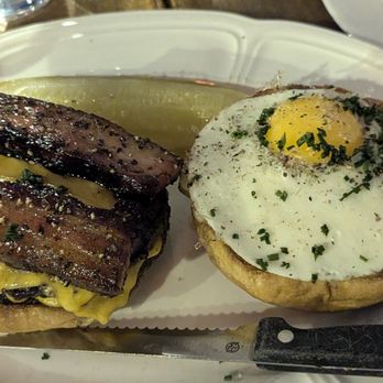 Au Cheval - Au Cheval burger topped with thick-cut pepper bacon and runny egg - Bars Near Me - Chicago, Illinois