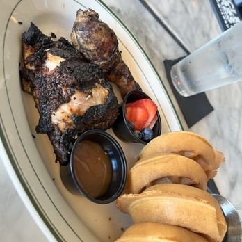Taste Kitchen Bar - Jerk Chicken and waffles (caramel on the side) - Breakfast & Brunch Near Me - Houston, Texas Taste Kitchen Bar - Jerk Chicken and waffles (caramel on the side) - Breakfast & Brunch Near Me - Houston, Texas