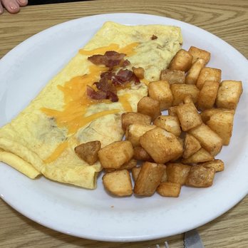 Sunny Street Cafe - Bacon omelet with home fries. - Breakfast & Brunch Near Me Sunny Street Cafe - Bacon omelet with home fries. - Breakfast & Brunch Near Me