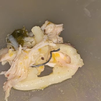 Caridad Restaurant - 2nd piece of metal. It's that silver/black/dark gray swirled thing. - Dominican Near Me - New York, New York
