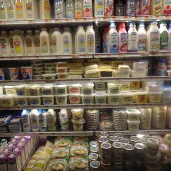Key Food - a display of dairy products in a grocery store - Imported Food Near Me - New York, New York