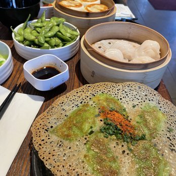 Dumpling Time - Berkeley - Top to bottom - BBQ Pork Bao, Edamame, Shrimp Har Gow and Seafood Gyoza - Chinese Near Me - Berkeley, California Dumpling Time - Berkeley - Top to bottom - BBQ Pork Bao, Edamame, Shrimp Har Gow and Seafood Gyoza - Chinese Near Me - Berkeley, California