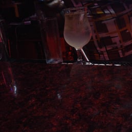 a person pouring a drink