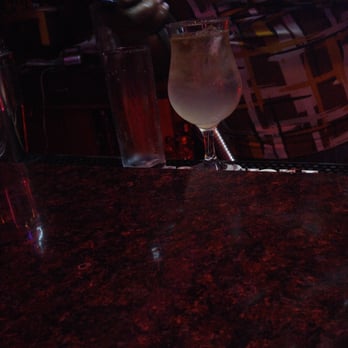 Marlo's Restaurant & Bar - a person pouring a drink - Seafood Near Me - Irvington, New Jersey Marlo's Restaurant & Bar - a person pouring a drink - Seafood Near Me - Irvington, New Jersey