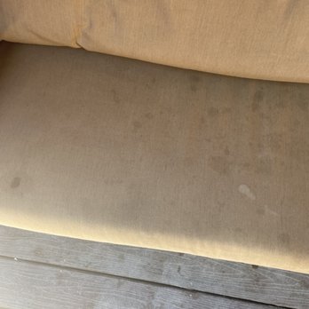 Six Flags Magic Mountain - Cabana#1 stains on the covering on the couch. - Amusement Parks Near Me - Valencia, California