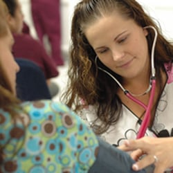 Cambridge Junior Collage - More Cambridge Junior College Medical Assistant students getting some hands-on experience checking blood pressure.