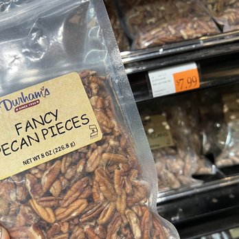Breaux Mart - a hand holding a bag of pecans - Grocery Near Me - New Orleans, Louisiana Breaux Mart - a hand holding a bag of pecans - Grocery Near Me - New Orleans, Louisiana