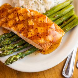 Smokehouse at Plain & Fancy Farm - Hot Honey Grilled Salmon with Aparagus.