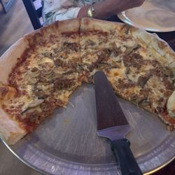 Large sausage and mushroom pie!   Love the sauce and the hominess to this place!