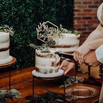 Cherry On Top Bakery Inc - a bride and groom cutting their wedding cake - Bakeries Near Me - Thornton, Colorado Cherry On Top Bakery Inc - a bride and groom cutting their wedding cake - Bakeries Near Me - Thornton, Colorado