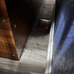Comfort Suites St. Louis - Sunset Hills - 1st room - dust bunnies and child's toy on floor
