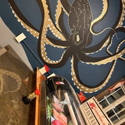 Elevation Sushi And Taco - Sushi counter and really cool wall mural
