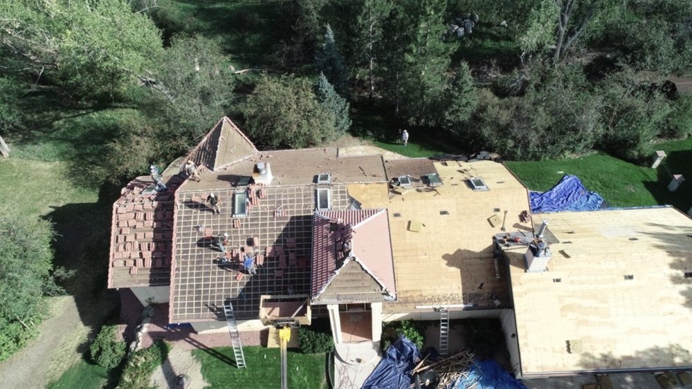 Slide of Masters Roofing & Construction