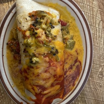 Frontier - Breakfast Burrito smothered in Christmas style Chile - Mexican Near Me - Albuquerque, New Mexico