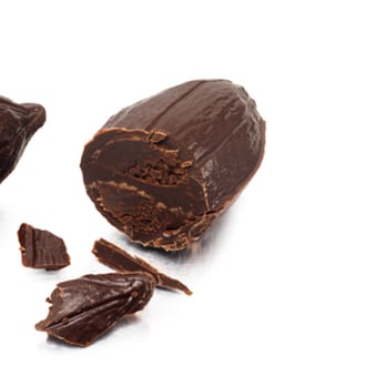 Neuhaus Belgian Chocolate - Criollo: bitter chocolate fresh butter cream centre, shaped like cocao pod - Chocolatiers & Shops Near Me - New York, New York Neuhaus Belgian Chocolate - Criollo: bitter chocolate fresh butter cream centre, shaped like cocao pod - Chocolatiers & Shops Near Me - New York, New York