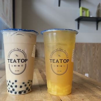 Tea Top - Sun Moon Lake Black Milk Tea with Boba (Left) Kumquat Green Tea with Lychee (Right) - Bubble Tea Near Me - Atlanta, Georgia Tea Top - Sun Moon Lake Black Milk Tea with Boba (Left) Kumquat Green Tea with Lychee (Right) - Bubble Tea Near Me - Atlanta, Georgia