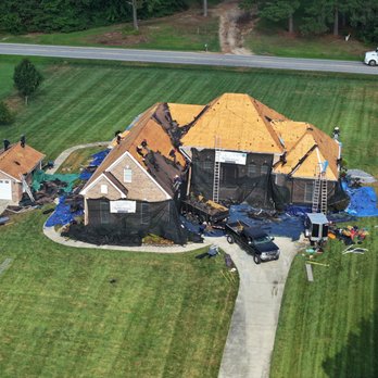 Barkley-Jensen Roofing & Restoration - "Full roof replacement in progress with Catch-All netting systems in place to protect landscaping and property during tear-off. - Roofing Near Me - Cary, North Carolina Barkley-Jensen Roofing & Restoration - "Full roof replacement in progress with Catch-All netting systems in place to protect landscaping and property during tear-off. - Roofing Near Me - Cary, North Carolina