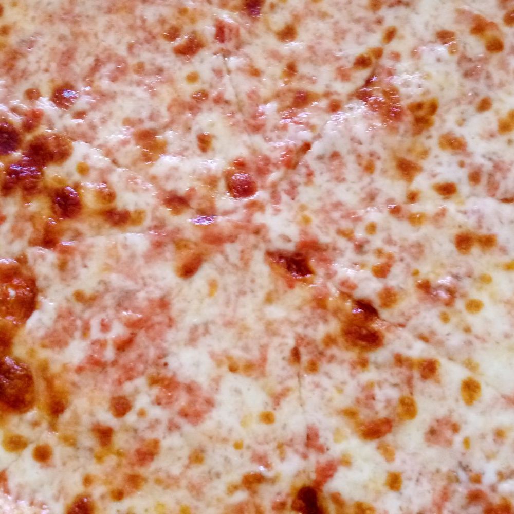 a cheese pizza in a box a cheese pizza in a box