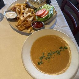 Chargrilled Moroccan Jerk Chicken with fontal cheese & shrimp bisque
