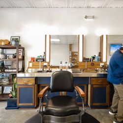 The Carpenters Chair Barbershop - Inside Carpenters Barbershop featuring professional barber chairs and a clean, comfortable setup.