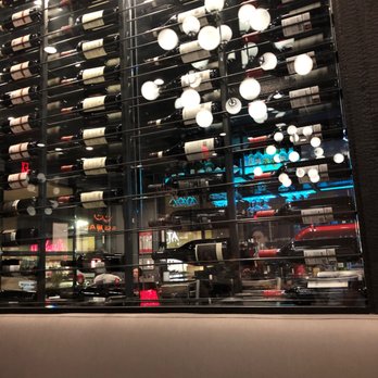 Millie's - The wine wall dividing the dining room and bar! - Italian Near Me - Staten Island, New York Millie's - The wine wall dividing the dining room and bar! - Italian Near Me - Staten Island, New York