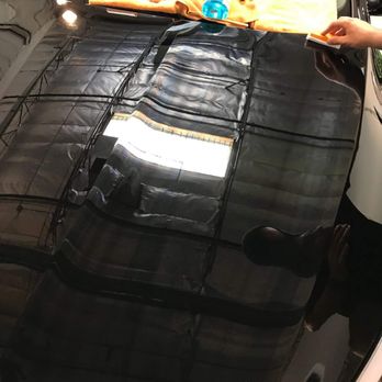 The Specialists Detail Studio - Its an illusion... can you see tje reflection of the ceiling on my car... awesome shine. - Auto Detailing Near Me - Las Vegas, Nevada