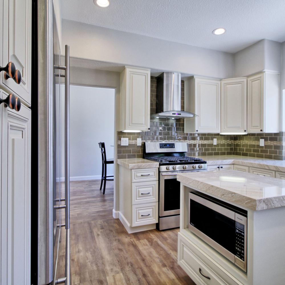 Premium Cabinets - Antique Mushroom cabinets with marble countertops - Kitchen & Bath Near Me - Tustin, California Premium Cabinets - Antique Mushroom cabinets with marble countertops - Kitchen & Bath Near Me - Tustin, California