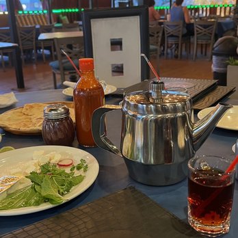 Bijan Persian Grill - Patio dining with the family - Persian/Iranian Near Me - Houston, Texas