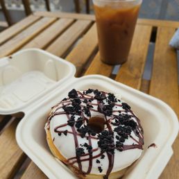 Cookies and cream donut and cold brew with oat milk creamer Cookies and cream donut and cold brew with oat milk creamer