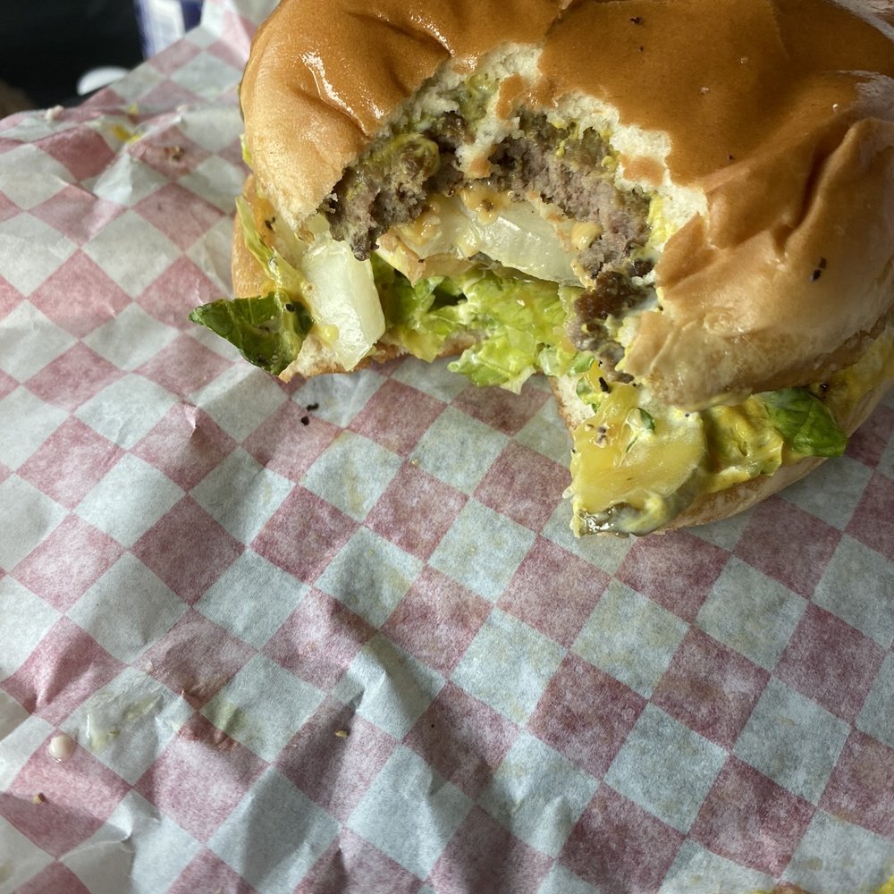 Don's Foods - Oops I've bitten into it now. It's over folks for this cheeseburger - Grocery Near Me - Dallas, Texas