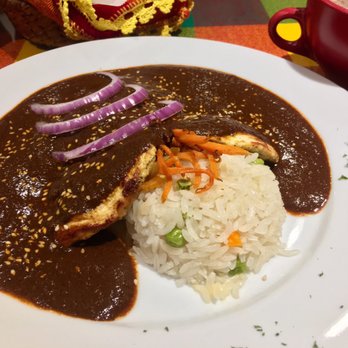 Restaurant Mole Del Rey - One of their special mole dishes with chicken. - Mexican Near Me - Bell, California Restaurant Mole Del Rey - One of their special mole dishes with chicken. - Mexican Near Me - Bell, California