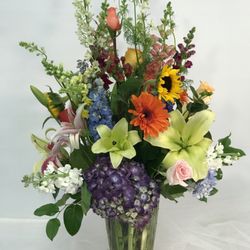 Gene's 5th Ave Florist - Send colorful flowers! We carry the largest assortment of fresh flowers in the area.