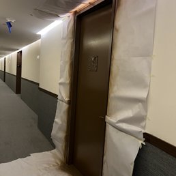 Door that was spray painted indoors creating toxic fumes in the hallway with absolutely NO VENTILATION!