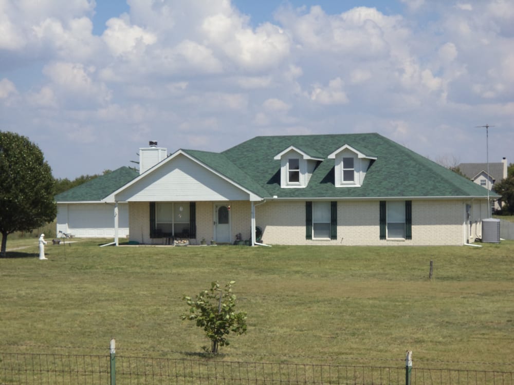 Slide of Quality Tops Roofing